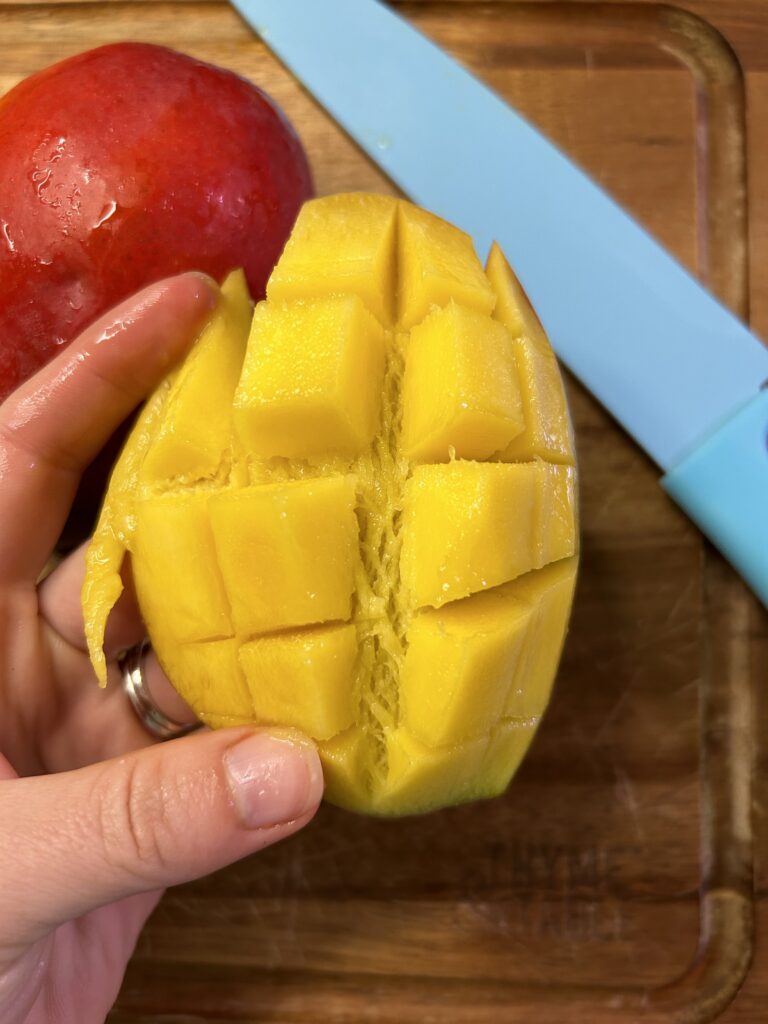 Mango with scored flesh