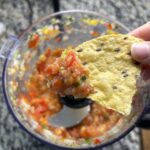 Tortilla chip with fresh mango salsa