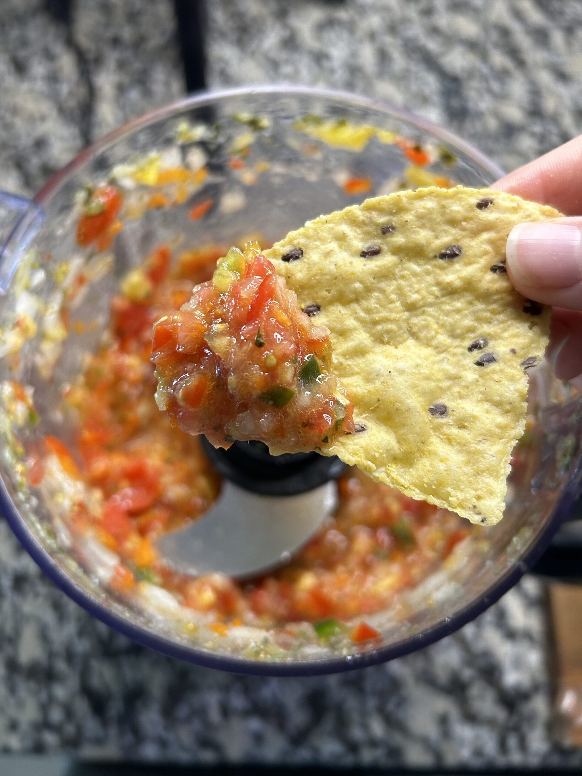 Tortilla chip with fresh mango salsa
