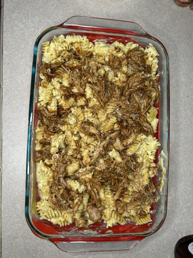 pulled pork mac and cheese in a dish