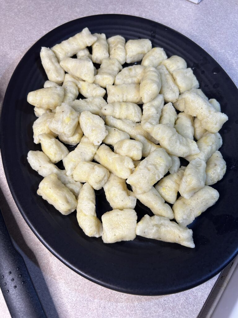 cooked potato gnocchi on a plate